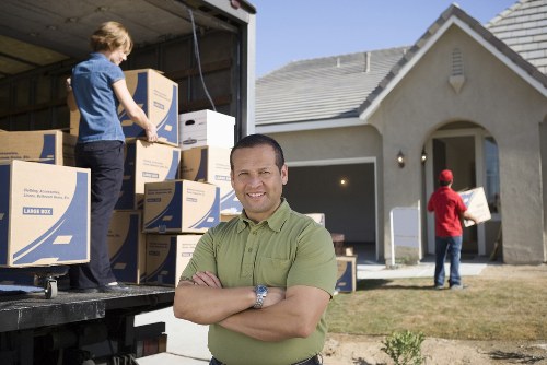 Commercial office movers in Uxbridge handling desks, files, and equipment carefully