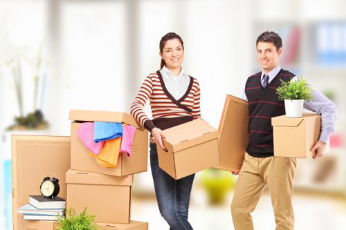 Packed boxes and furniture ready for transport during a house move