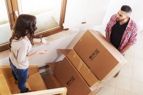 Uxbridge movers organizing packing materials for a smooth relocation