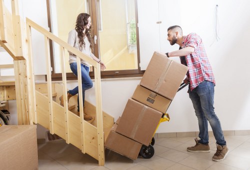 Professional movers handling household items during an Uxbridge relocation