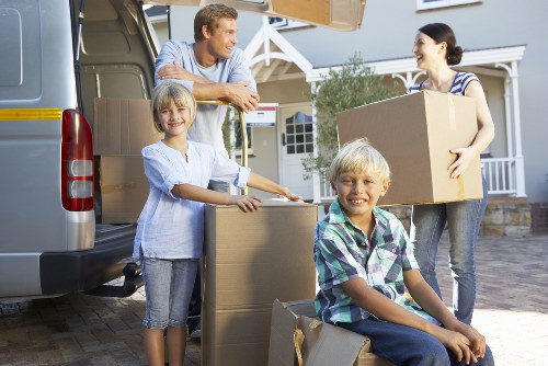 Loading furniture into a moving truck for a local Uxbridge relocation