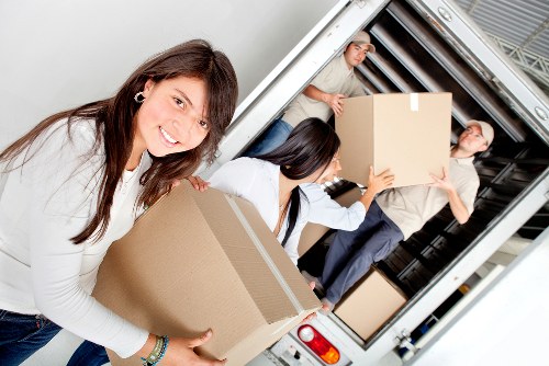 Careful handling of an upright piano during transport