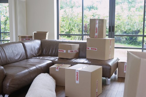 Man with van loading boxes for a residential move in Uxbridge